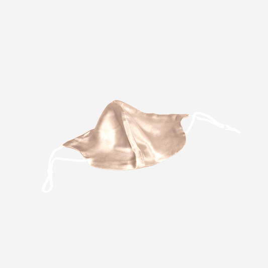 Elevate Your Safety Routine with Our 2-Layer 100% Mulberry Silk Face Mask in Champagne - Handmade with High Quality Silk for a Soft and Comfortable Fit. Breathable and Skin-Friendly. Oeko-Tex® Certified for Safe and Eco-Friendly Use. Made in Suzhou, China, the Home of Mulberry Silk.
