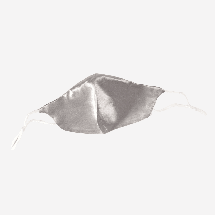 Our 2-layer 100% Mulberry Silk Face Mask in Silver Grey color is handmade and crafted with high-quality silk, offering a comfortable and breathable wearing experience. The mask is adjustable, skin-friendly, and made from 100% 6A Grade Mulberry Silk. It is also Oeko-Tex certified, safe, eco-friendly, and non-toxic. The mask is made in Suzhou, China, known for its rich history in producing high-quality silk. It can be easily hand washed and tumble dried for easy maintenance.
