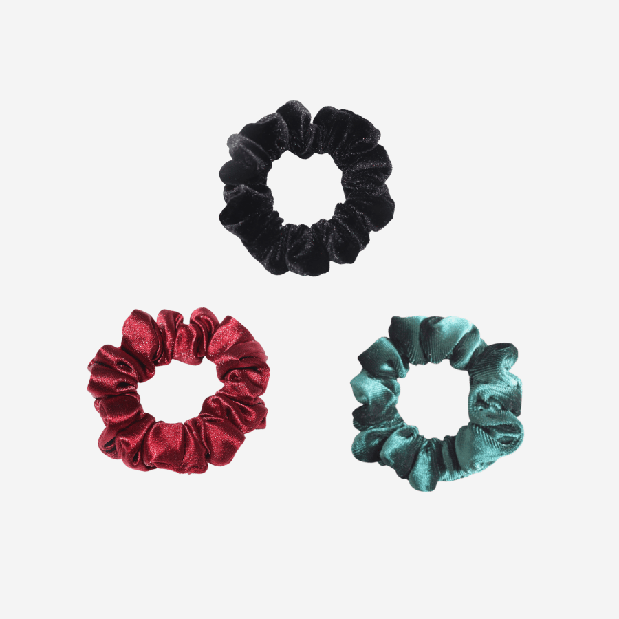 Upgrade your hair accessory game with our 3 Pack of Small Velvet Scrunchies. Made of soft and plush velvet material, they provide gentle hold to your hair while keeping it stylish and cozy. These scrunchies come in a pack of 3, making them a great value for their quality. Whether you have a casual or a formal look, these velvet scrunchies are a perfect finishing touch.