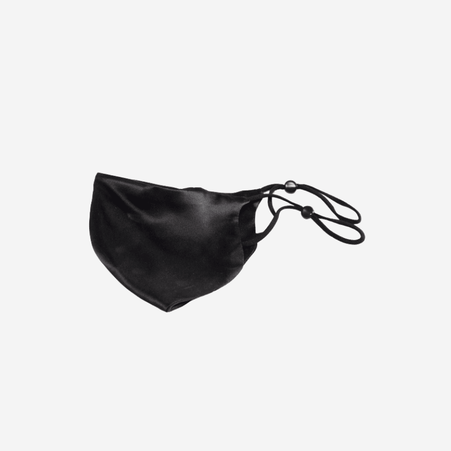 Stay Safe in Style with Our 2-Layer 100% Mulberry Silk Face Mask in Black - Handmade with High Quality Silk for a Soft and Comfortable Fit. Breathable and Skin-Friendly. Oeko-Tex® Certified for Safe and Eco-Friendly Use. Made in Suzhou, China, the Home of Mulberry Silk.