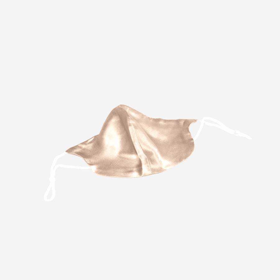 Elevate Your Safety Routine with Our 2-Layer 100% Mulberry Silk Face Mask in Champagne - Handmade with High Quality Silk for a Soft and Comfortable Fit. Breathable and Skin-Friendly. Oeko-Tex® Certified for Safe and Eco-Friendly Use. Made in Suzhou, China, the Home of Mulberry Silk.