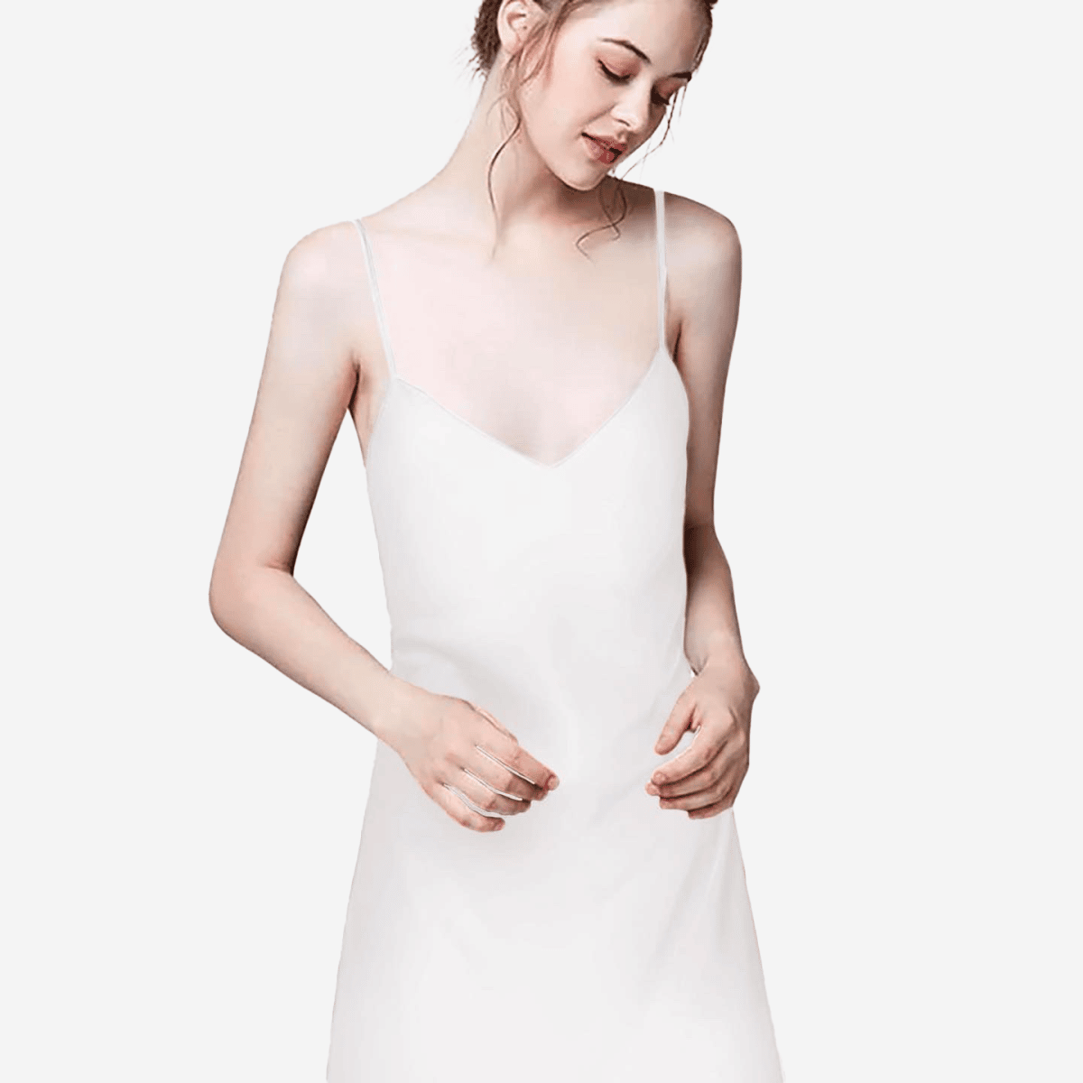 Care for Your Silk Slip Dress with Ease - Dry Clean or Cool Hand Wash with Gentle Detergent. No Bleach, Fabric Softener, Tumble Dry or Wringing. Line Dry in Shade and Cool Iron Without Steam for Best Results.