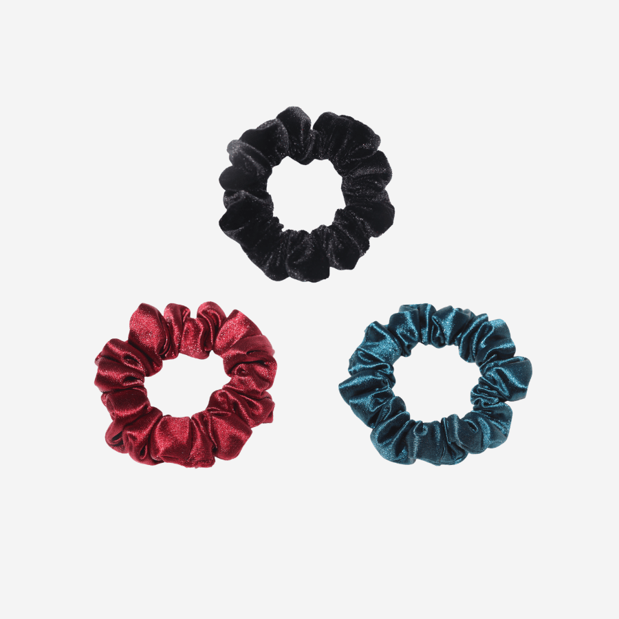 Upgrade your hair accessory game with our 3 Pack of Small Velvet Scrunchies. Made of soft and plush velvet material, they provide gentle hold to your hair while keeping it stylish and cozy. These scrunchies come in a pack of 3, making them a great value for their quality. Whether you have a casual or a formal look, these velvet scrunchies are a perfect finishing touch.